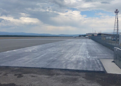 Newly applied asphalt in a spacious lot