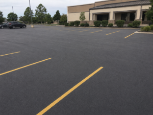 After parking lot asphalt maintenance